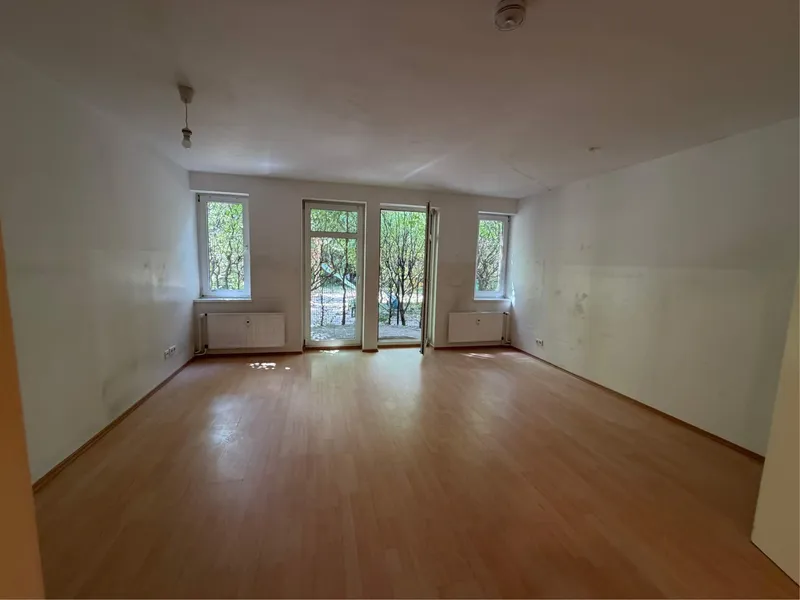 Wohnen und Arbeiten: 3-Zimmer-Wohnung mit Terrasse und Gartenanteil — photo 1